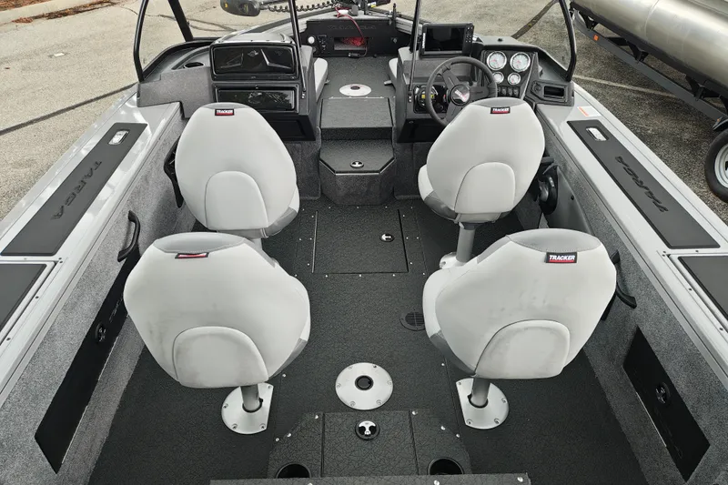 Slide: The Image of Interior of 2027 Tracker Targa V-18 Combo boat with four seats and control panel. - 23