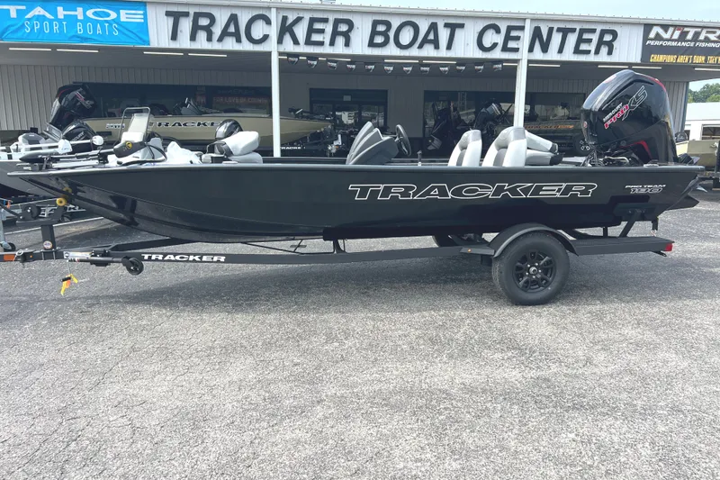 The Image of 2027 Tracker Pro Team 190 boat on trailer at dealership. - 0
