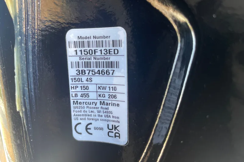 Slide: The Image of Label on Mercury Marine engine, model 1150F13ED, serial 3B754667, 150 HP, 2027 Sun Tracker. - 103