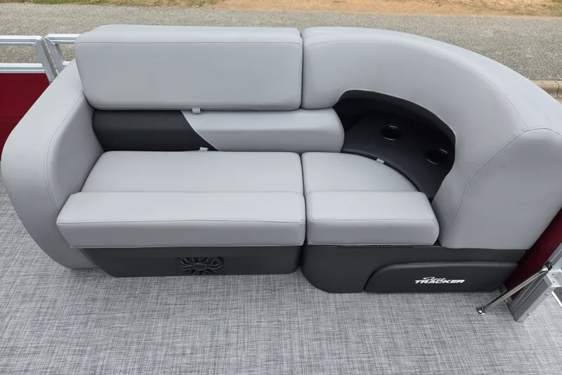Slide: The Image of Gray seating on 2027 Sun Tracker SportFish 22 DLX pontoon boat with cup holders. - 15