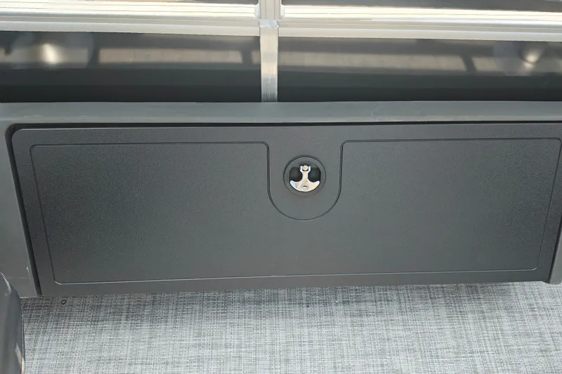 Slide: The Image of Storage compartment on 2027 Sun Tracker SportFish 22 DLX pontoon boat. - 18