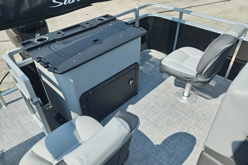 Slide: The Image of 2027 Sun Tracker SportFish 22 DLX boat interior with seating and storage. - 21