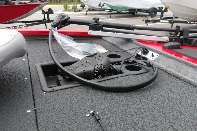 Slide: The Image of 2027 Tracker Pro Team 195 boat deck with trolling motor and cup holders. - 18