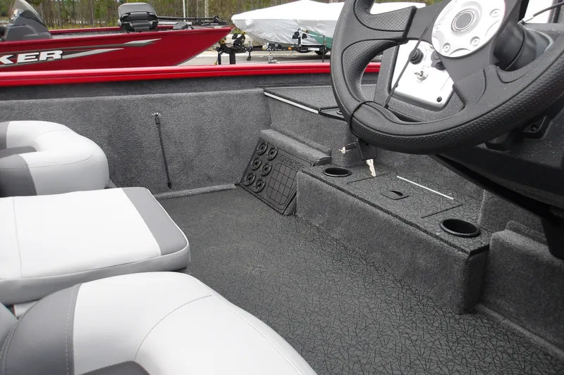 Slide: The Image of Interior of 2027 Tracker Pro Team 195 boat with steering wheel and seating. - 16