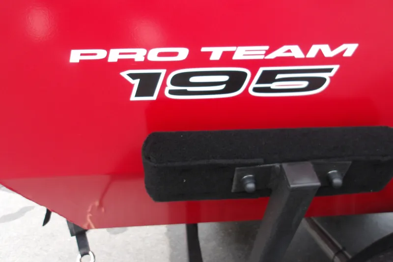 Slide: The Image of Red Tracker Pro Team 195 boat, model year 2027, with bold white lettering. - 19