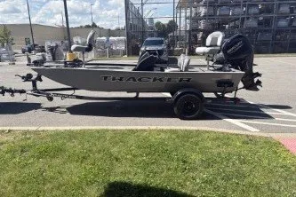 The Image of 2027 Tracker Pro 170 boat on trailer in parking lot. - 0