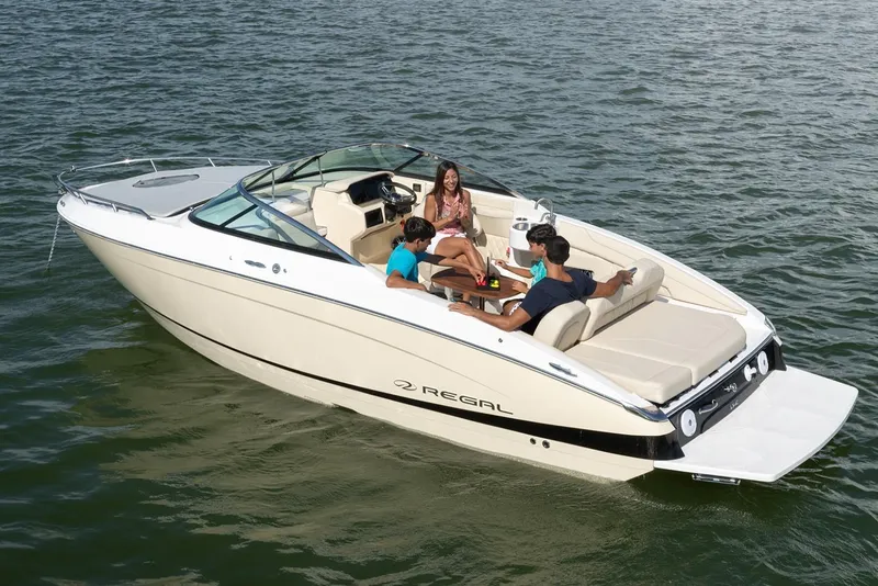 The Image of Manufacturer Provided Image: 2026 Regal LS4C boat with passengers enjoying a sunny day on the water. - 1