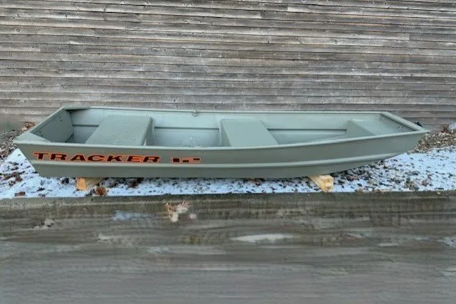 The Image of 2027 Tracker Grizzly 12 Jon boat on display, featuring a sleek, durable design. - 0