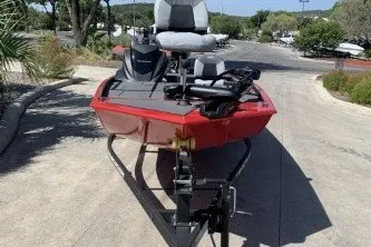 The Image of 2027 Tracker Pro 170 boat on trailer, parked outdoors in sunny setting. - 0
