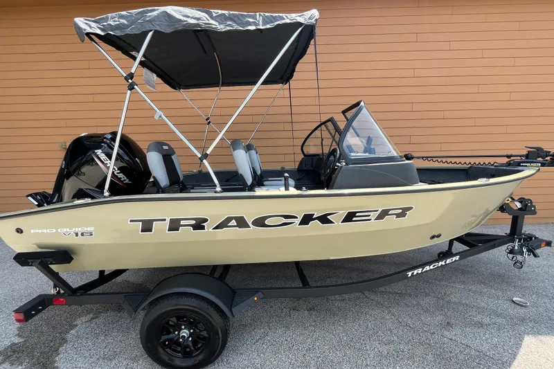 The Image of 2027 Tracker Pro Guide V-16 WT boat with canopy on trailer. - 0