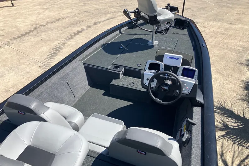Slide: The Image of 2027 Tracker Pro Team 190 boat interior with steering wheel and seating. - 13