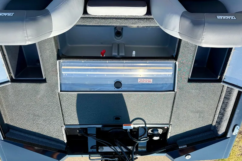 Slide: The Image of 2027 Tracker Pro Team 190 boat interior with storage compartments and seating. - 15