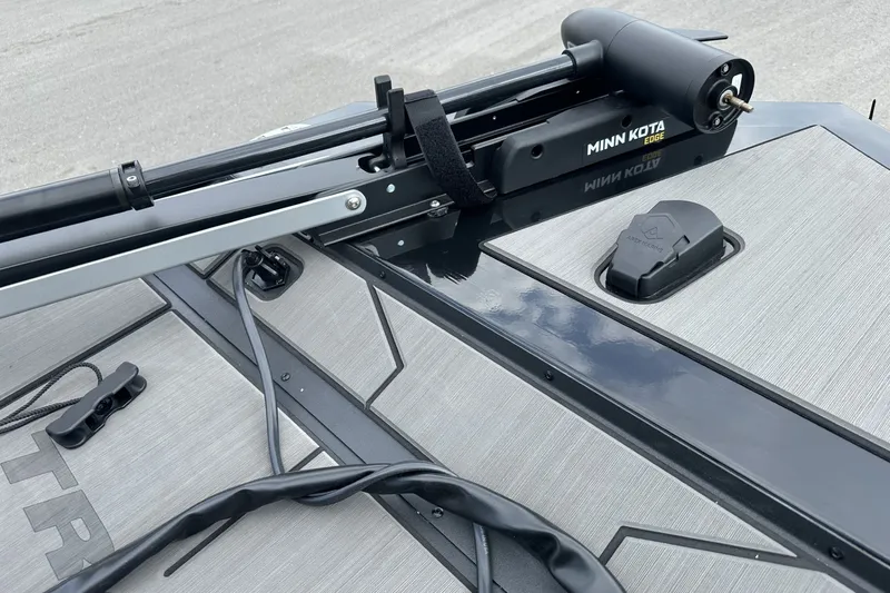 Slide: The Image of 2027 Tracker Pro 170 boat with Minn Kota Edge trolling motor on deck. - 13