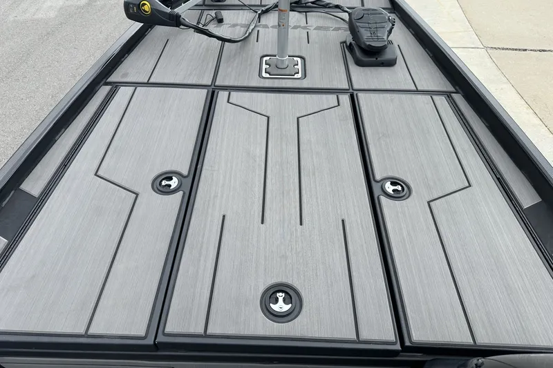 Slide: The Image of 2027 Tracker Pro 170 boat deck with sleek, modern design and storage compartments. - 14