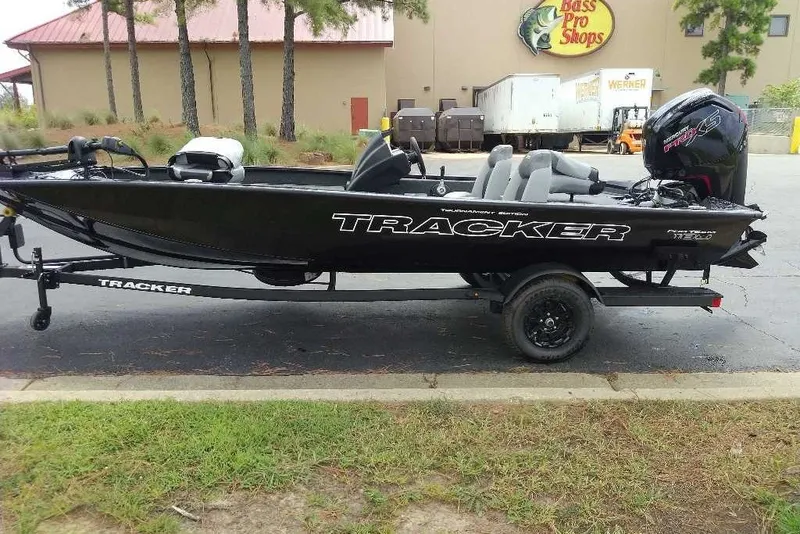 The Image of 2027 Tracker Pro Team 190 boat on trailer outside Bass Pro Shops. - 0