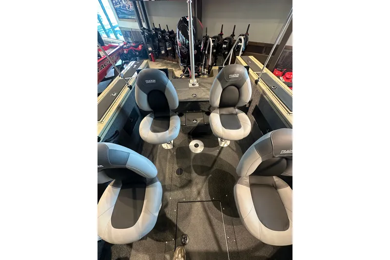 Slide: The Image of Interior of 2027 Tracker Targa V-18 Combo boat with four cushioned seats. - 25