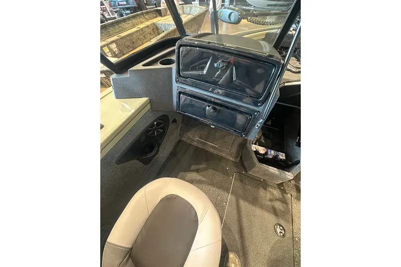 Slide: The Image of Interior of 2027 Tracker Targa V-18 Combo boat with dashboard and seating. - 20
