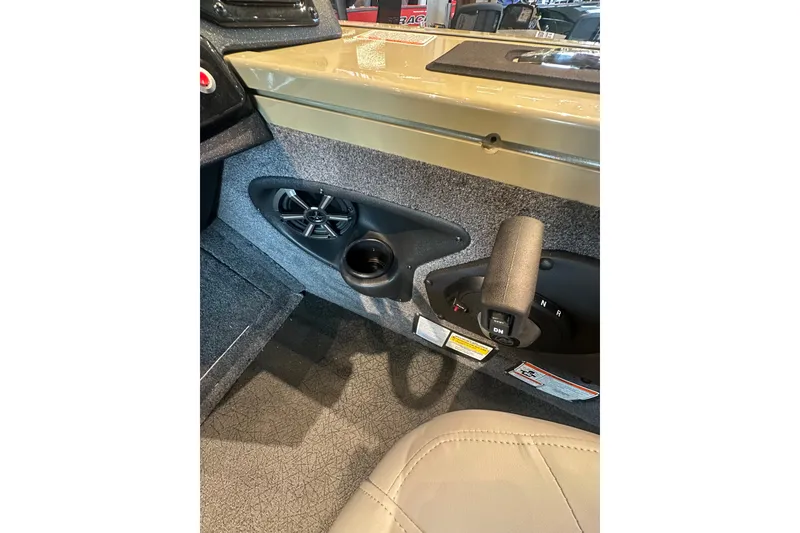Slide: The Image of Interior of 2027 Tracker Targa V-18 Combo boat with speaker and control panel. - 33