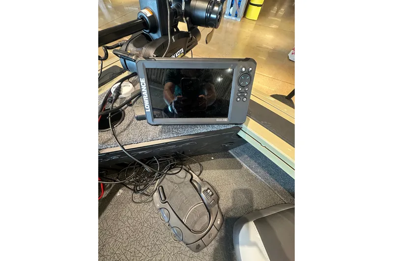 Slide: The Image of Fishfinder and foot pedal on a 2027 Tracker Targa V-18 Combo boat. - 27
