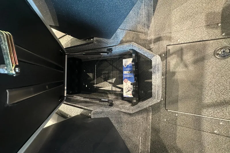 Slide: The Image of Interior storage compartment of 2027 Tracker Targa V-18 Combo boat. - 23