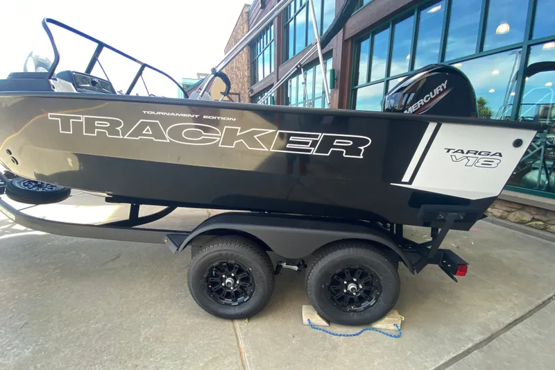 The Image of 2027 Tracker Targa V-18 Combo boat on trailer, displayed outdoors. - 0