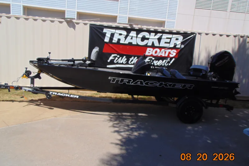 The Image of 2027 Tracker Pro 170 boat on trailer, displayed outdoors with promotional banner. - 0