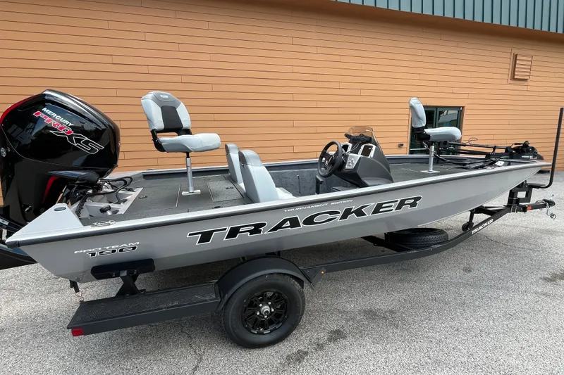 The Image of 2027 Tracker Pro Team 190 fishing boat on trailer, featuring Mercury engine. - 0