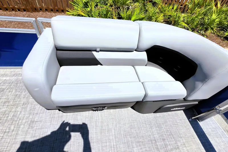 Slide: The Image of 2027 Sun Tracker SportFish 22 DLX boat seat with white upholstery and modern design. - 19