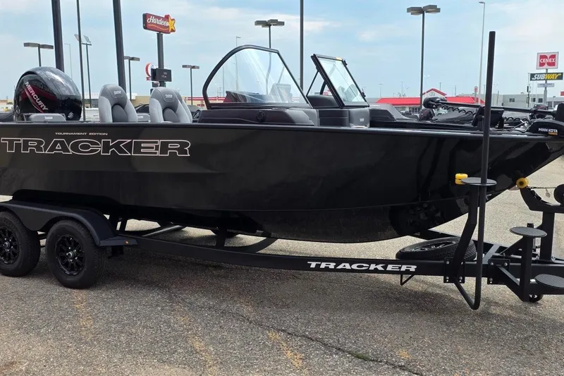 Slide: The Image of 2027 Tracker Targa V-18 Combo boat on trailer in parking lot. - 37
