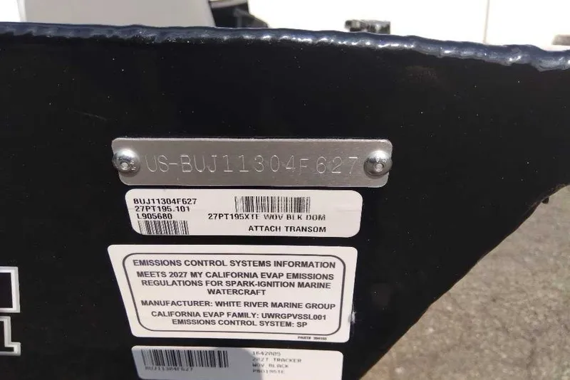 Slide: The Image of Hull identification number on a 2027 Tracker Pro Team 195 boat, showing emissions compliance. - 13