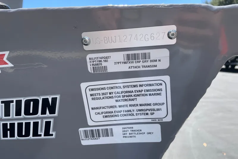 Slide: The Image of 2027 Tracker Pro Team 190 boat with emissions control information and hull identification. - 53