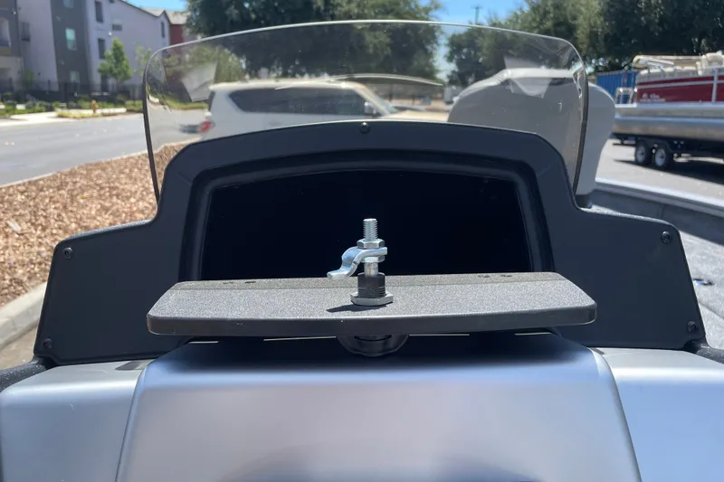 Slide: The Image of 2027 Tracker Pro Team 190 dashboard with windshield and mounting bracket. - 15