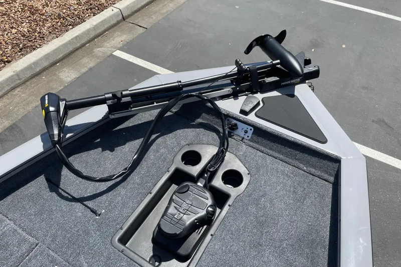 Slide: The Image of 2027 Tracker Pro Team 190 boat with Minn Kota trolling motor on deck. - 24