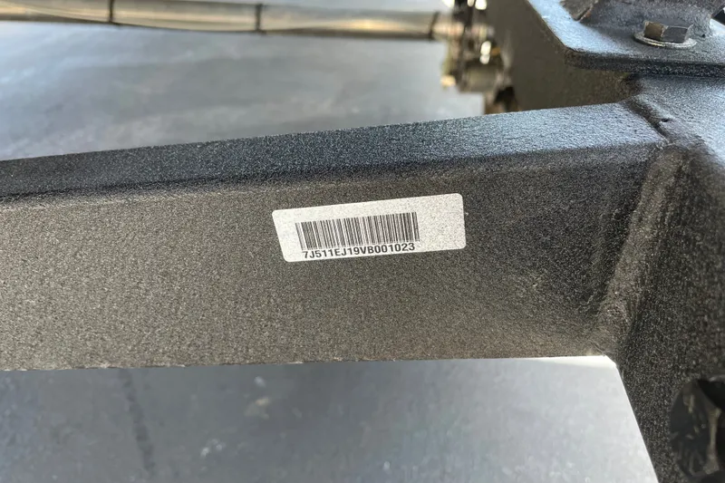 Slide: The Image of Barcode on 2027 Tracker Pro Team 190 boat trailer frame. - 55