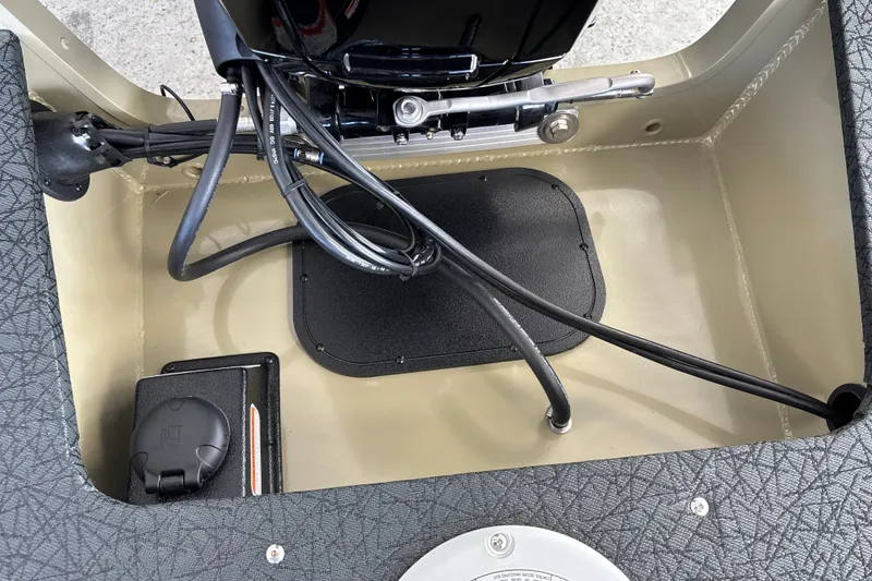 Slide: The Image of Interior view of 2027 Tracker Pro Guide V-16 WT boat showing wiring and components. - 33