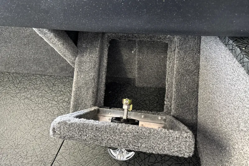 Slide: The Image of Carpeted interior detail of a 2027 Tracker Pro Guide V-16 WT boat. - 24