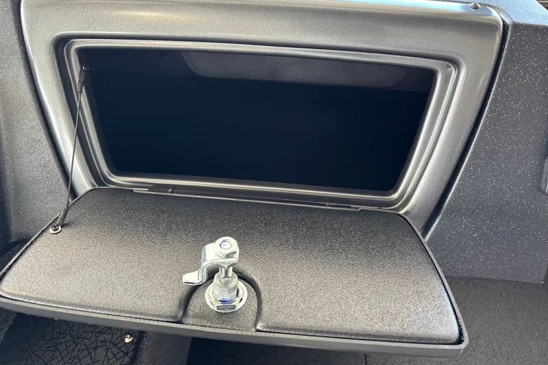 Slide: The Image of Open storage compartment in 2027 Tracker Pro Guide V-16 WT boat. - 23