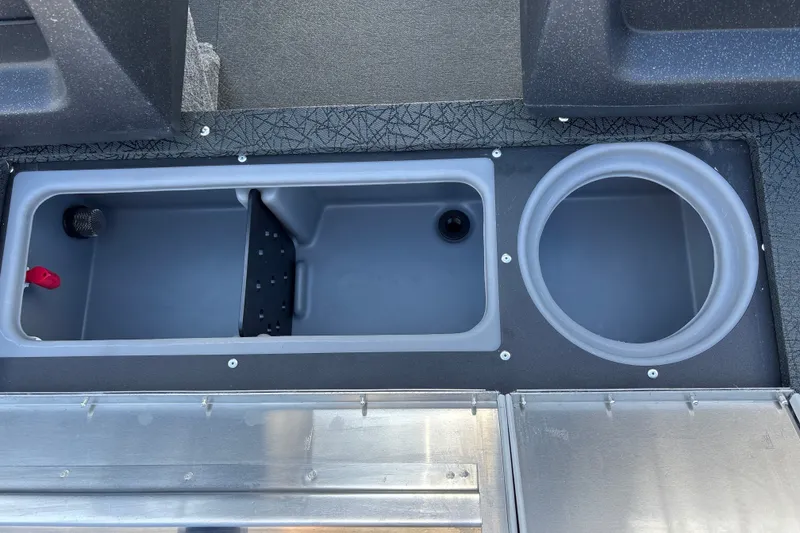 Slide: The Image of 2027 Tracker Pro Guide V-16 WT boat storage compartments, featuring durable design and ample space. - 28