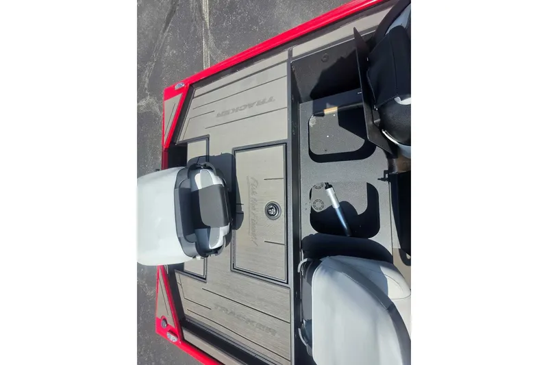 Slide: The Image of 2027 Tracker Pro 170 boat interior with seating and storage compartments. - 33