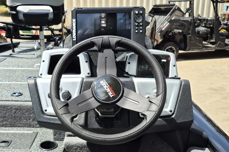 Slide: The Image of Steering wheel of 2027 Tracker Pro Team 195 boat with Lowrance display. - 37