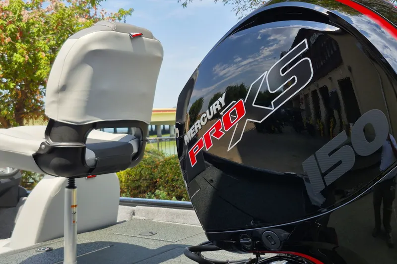 Slide: The Image of 2027 Tracker Pro Team 195 boat with Mercury Pro XS 150 engine, featuring a comfortable seat. - 36