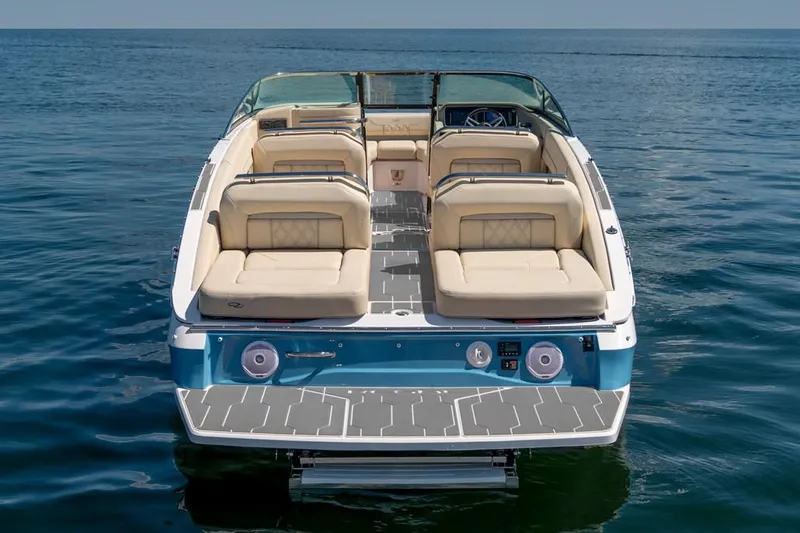 Slide: The Image of Manufacturer Provided Image: 2026 Regal LS6 boat with beige seating on open water. - 5