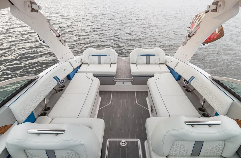 Slide: The Image of Manufacturer Provided Image: Luxurious 2026 Regal LS9 boat interior with spacious seating on calm water. - 6