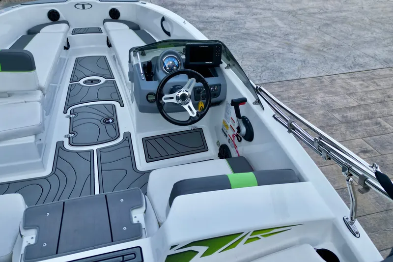 Slide: The Image of 2022 Tahoe T18 boat interior with modern dashboard and stylish seating. - 5