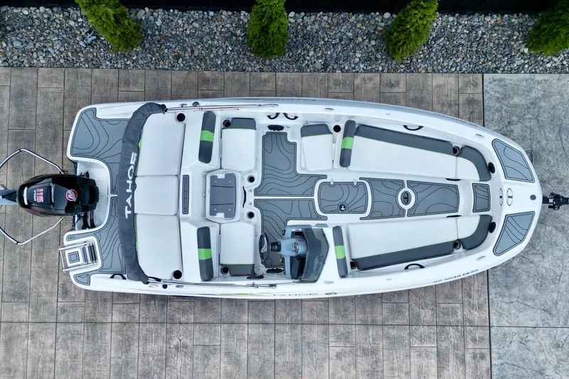 Slide: The Image of 2022 Tahoe T18 boat, aerial view, sleek design, spacious seating, modern layout. - 13