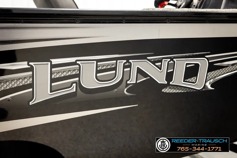 Slide: The Image of 2017 Lund 1650 Rebel XS SS boat branding with Reeder Trausch Marine contact details. - 43