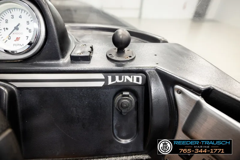 Slide: The Image of Dashboard of 2017 Lund 1650 Rebel XS SS boat with RPM gauge and 12V outlet. - 30