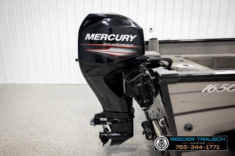 Slide: The Image of 2017 Lund 1650 Rebel XS SS boat with Mercury FourStroke outboard motor in showroom. - 37