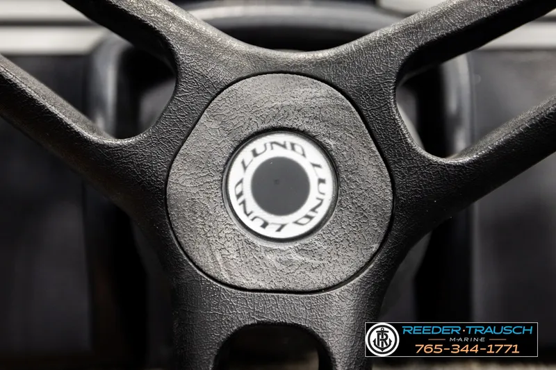 Slide: The Image of Steering wheel of 2017 Lund 1650 Rebel XS SS boat, close-up view. - 28