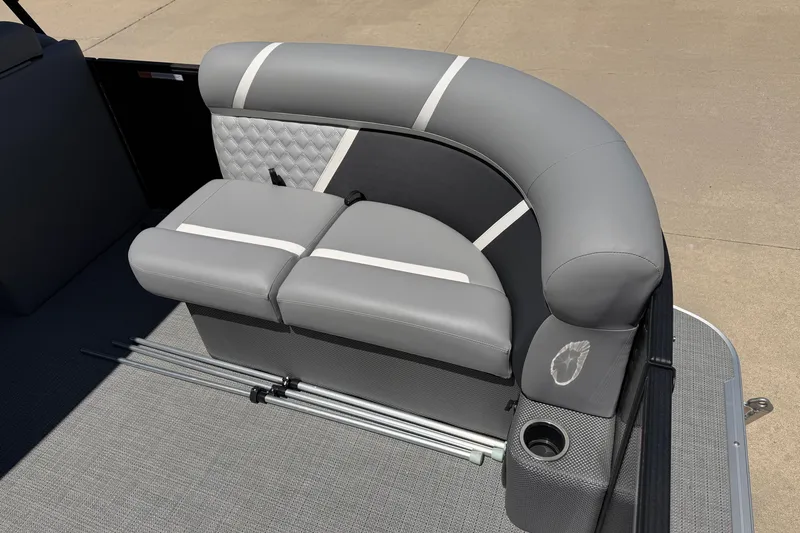 Slide: The Image of Gray seating on 2025 Crest Classic 200 boat with cup holder and storage. - 5